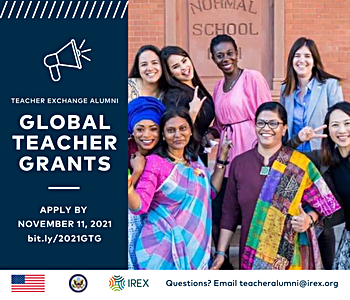 teachers posing in a group with text overlay announcing Global Teacher Grant application information
